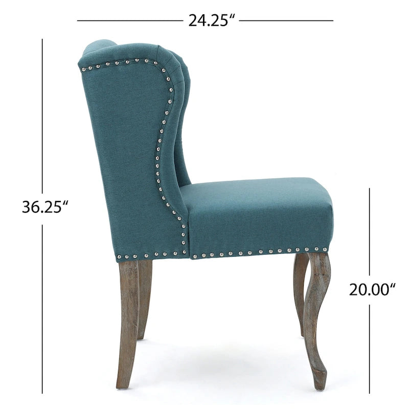 Sillón decorativo de una plaza con respaldo alto, color verde azulado, con botones capitoné y estructura de madera de caucho