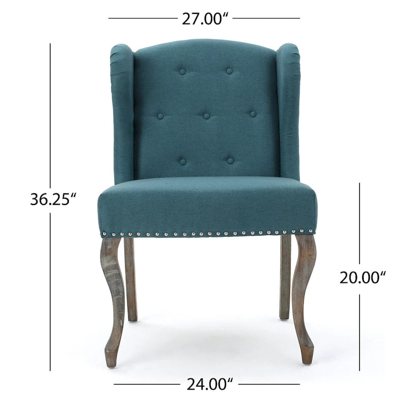 Sillón decorativo de una plaza con respaldo alto, color verde azulado, con botones capitoné y estructura de madera de caucho