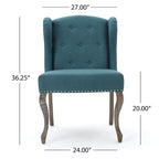 Sillón decorativo de una plaza con respaldo alto, color verde azulado, con botones capitoné y estructura de madera de caucho
