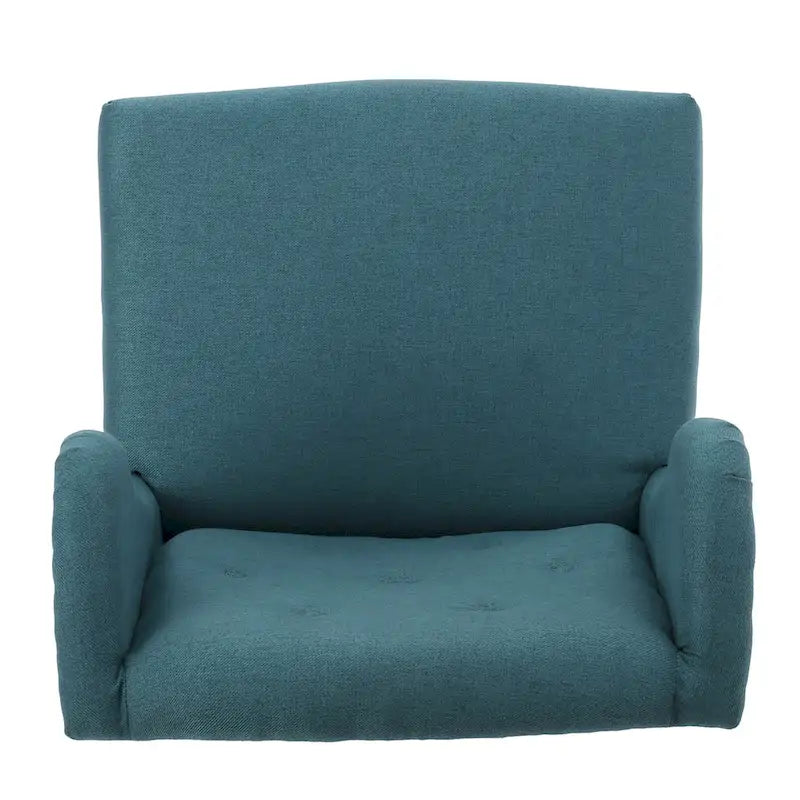 Sillón decorativo de una plaza con respaldo alto, color verde azulado, con botones capitoné y estructura de madera de caucho