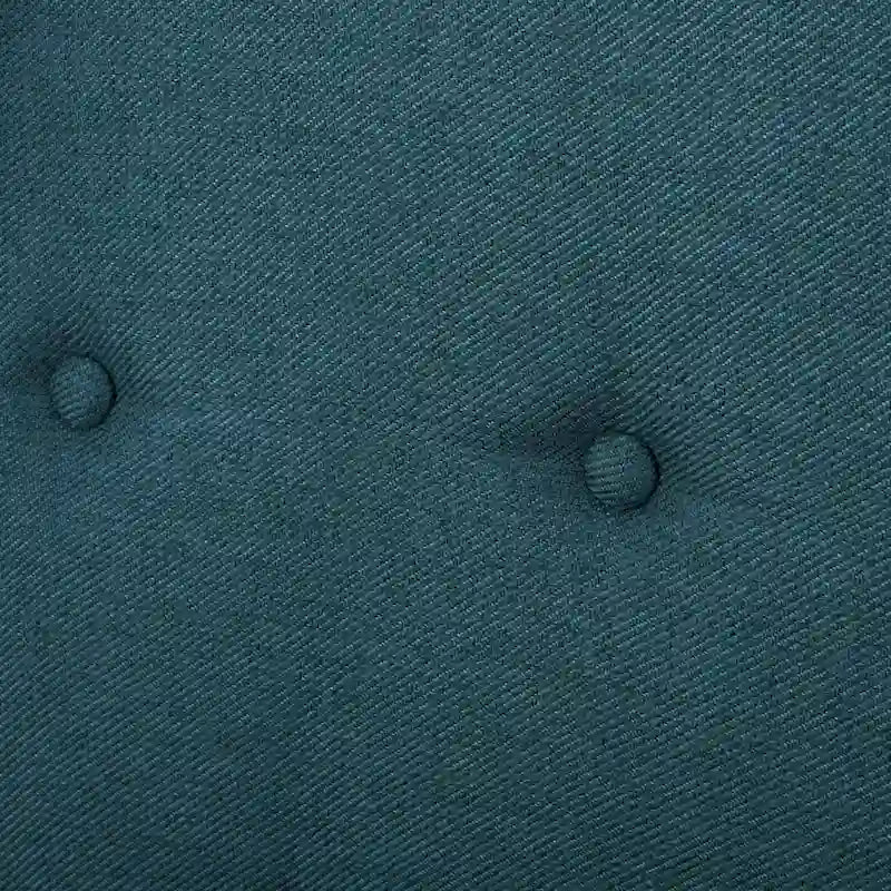 Sillón decorativo de una plaza con respaldo alto, color verde azulado, con botones capitoné y estructura de madera de caucho